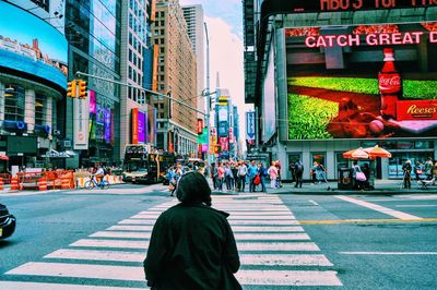 People on city street at times square