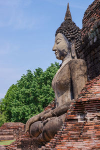 Low angle view of statue against sky