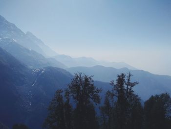 Scenic view of mountains against sky at triund landscape