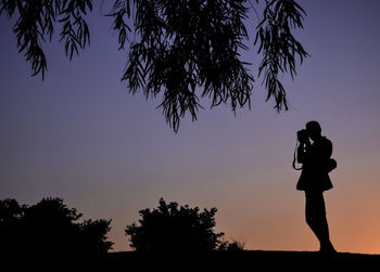 Photographer shadow sky at sunset