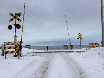 Scenic view of sea against sky during winter