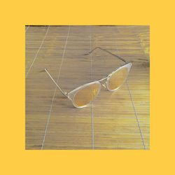 Close-up of sunglasses on table