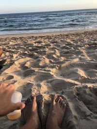 Low section of people on beach