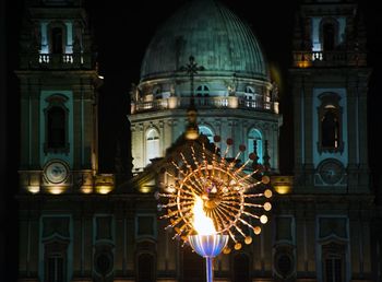 Rio de janeiro illuminated cathedral with peoples olympics pyre