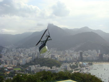 View of buildings in city against sky