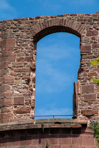 Low angle view of old building against sky