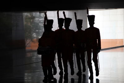 Marching band walking in tunnel