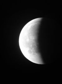 Low angle view of moon against sky at night