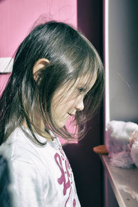 Close-up of young woman at home