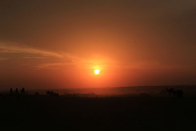 Scenic view of sea at sunset