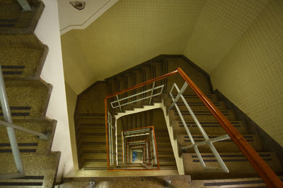 Low angle view of spiral staircase in building