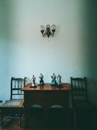 High angle view of statues on table at home