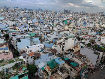 High angle view of modern buildings against sky