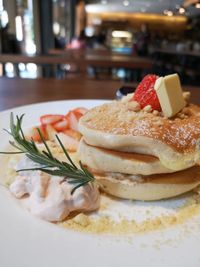 Close-up of served pancakes in plate