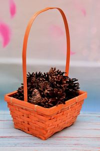 Close-up of pumpkin in basket on table