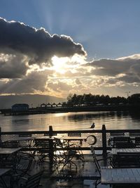 Scenic view of lake against sky during sunset