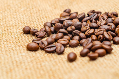 Close-up of coffee beans on burlap