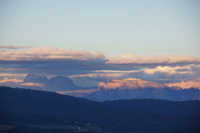 Scenic view of silhouette mountains against sky during sunset