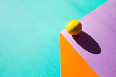 High angle view of yellow toy on table