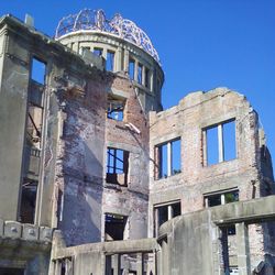 Low angle view of abandoned building against clear sky