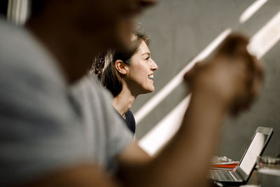 Smiling businesswoman sitting in office