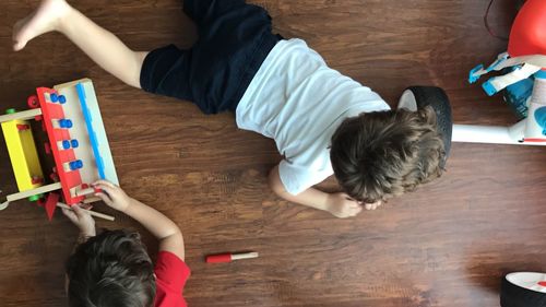 High angle view of child on table at home