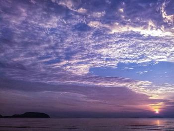 Scenic view of sea against dramatic sky