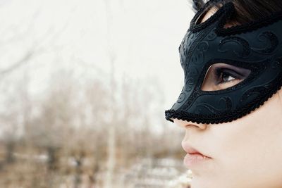 Close-up of woman wearing eye mask