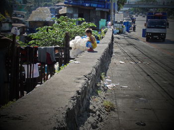 View of road along buildings