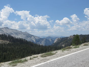 Scenic view of landscape and mountains against sky