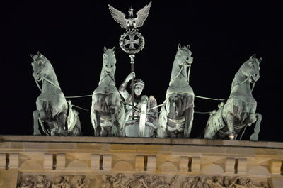 Low angle view of statue in city