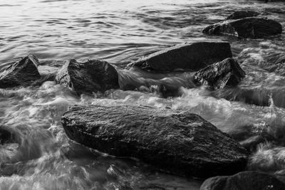 Scenic view of sea with rock objects 