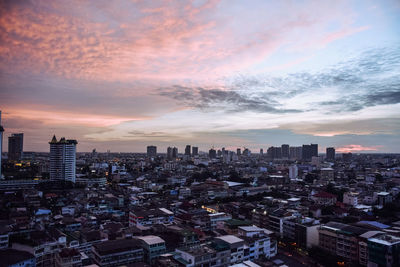 High angle view of buildings against sky during sunset