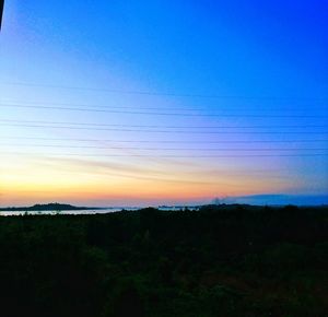 Scenic view of silhouette landscape against sky during sunset