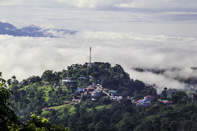 High angle view of trees and buildings against sky