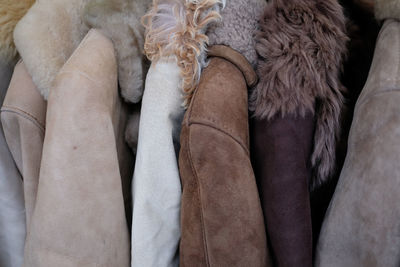 Close-up of coats at store for sale