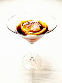 Close-up of drink over white background