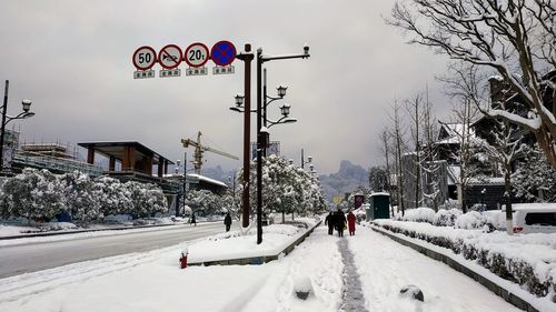 People walking on street in winter