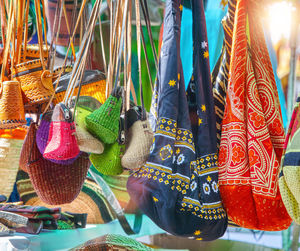 Close-up of clothes hanging in store for sale