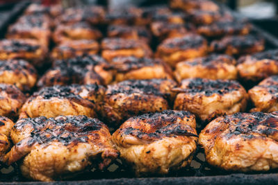 Close-up of meat on barbecue grill