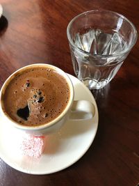 High angle view of coffee cup on table