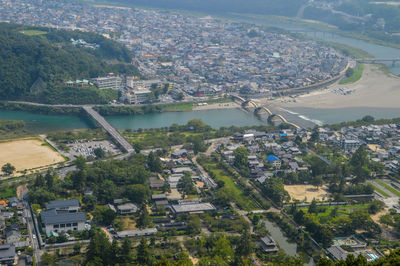 Aerial view of town against sky