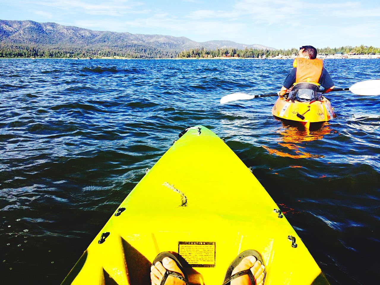 water, nautical vessel, transportation, boat, yellow, mode of transport, sea, kayak, lake, river, leisure activity, travel, vacations, mountain, oar, tranquility, waterfront, rippled, lifestyles