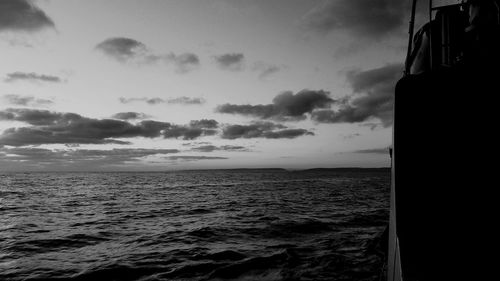 Scenic view of sea against sky at sunset