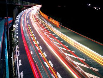 High angle view of light trails on city street