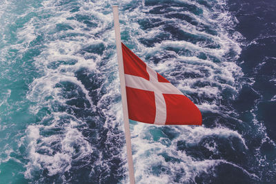 High angle view of flag on sea