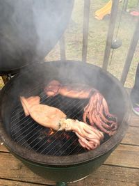 Close-up of meat on barbecue grill