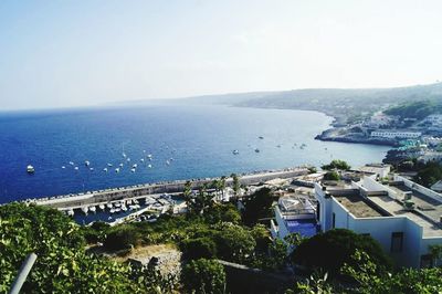 View of cityscape with sea in background