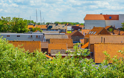 High angle view of buildings against sky