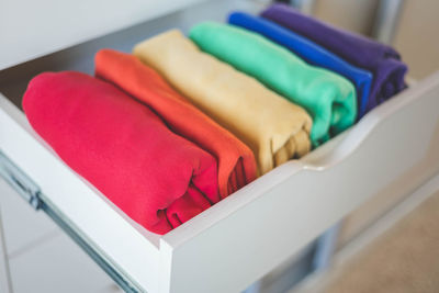 High angle view of multi colored towels on table